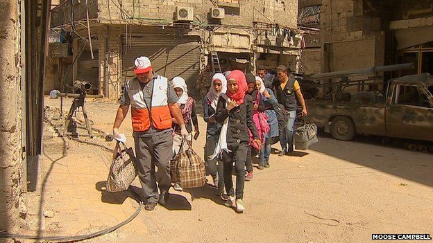 Students being allowed out of Yarmouk