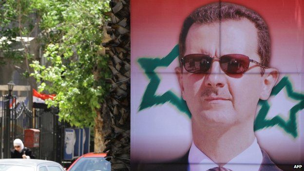 An election campaign poster bearing a portrait of President Bashar al-Assad (May 2014)