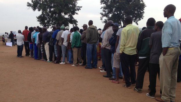 People queuing to vote