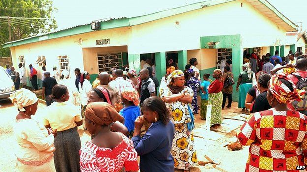 Relatives of victims gather at the mortuary in Jos. 21 May 2014