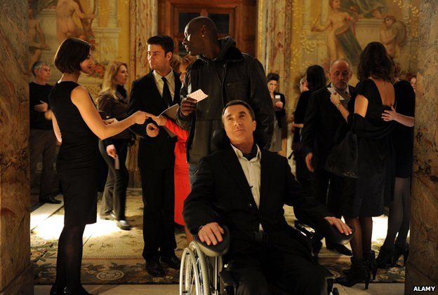 Omar Sy and Francois Cluzet in a scene from the film Les Intouchables, 2011