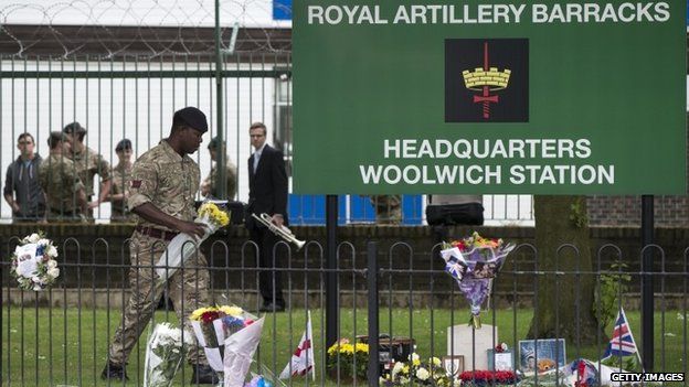 A soldier pays tribute to Fusilier Lee Rigby