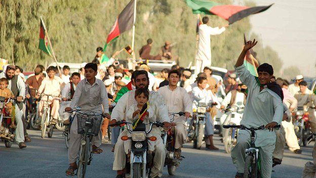Cricket fans in Kandahar celebrate the Afghan team's qualification for the world cup