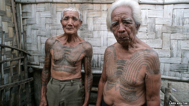 Kalinga tribe elders displaying tattoos
