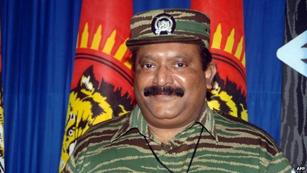 This undated handout picture released by the Liberation Tigers for Tamil Eelam (LTTE), LTTE leader Velupillai Prabhakaran poses at an undisclosed location in Sri Lanka. The leader of Sri Lanka's Tamil Tiger rebels, Velupillai Prabhakaran, was shot dead on 18 May, 2009 while trying to flee government troops.