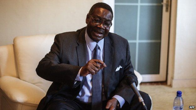 Malawian presidential candidate Peter Mutharika, brother of the late president Bingu wa Mutharika, gestures during a press conference at his residence on 22 May 2014, Blantyre, Malawi