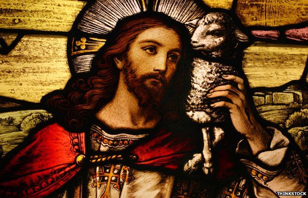 Stained glass of Jesus with lamb
