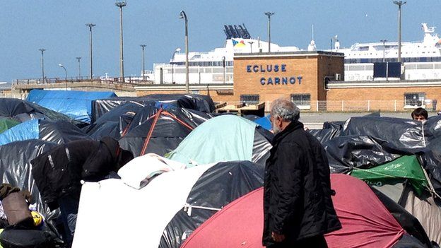 An informal tent camp in full view of Calais harbour