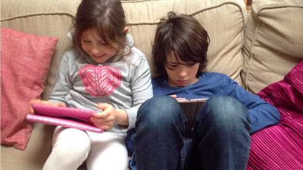 Lily and Archie using tablets
