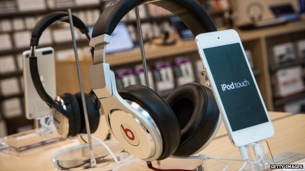 Beats headphones are sold along side iPods in an Apple store