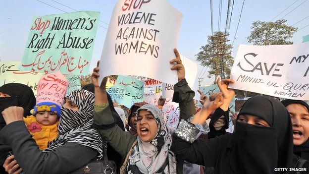 Supporters of Tehrik-e-Minhaj ul Quran, an Islamic Organisation protest against 'honour killings' of women in Lahore on November 21, 2008. Human rights lawyer Zia Awan said that more than 62,000 cases of women abused in Pakistan since the year 2000 and 159 women died in honour killings in the year to September 30
