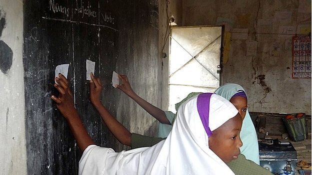 Children at a blackboard in Nigerian school
