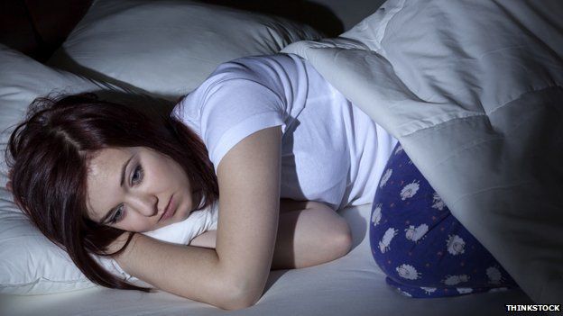Woman having trouble sleeping