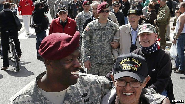 American veterans joined by serving soldiers
