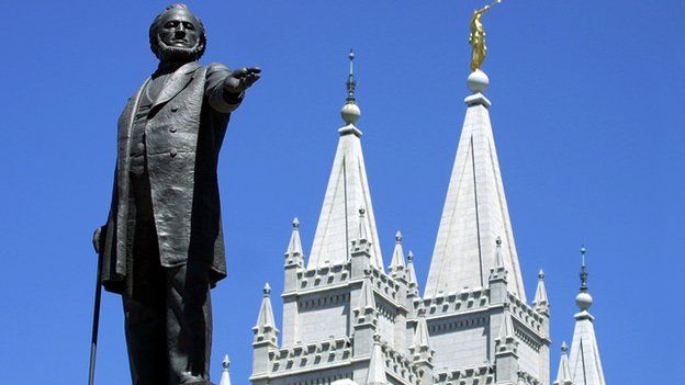 A statue of Brigham Young, an early leader of the Mormon Church, stands in front of the Mormon Temple in Salt Lake City, Utah.