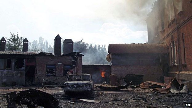 A burning house in the aftermath of fighting between pro-Russian militants and Ukrainian forces in Sloviansk. Photo: 8 June 2014