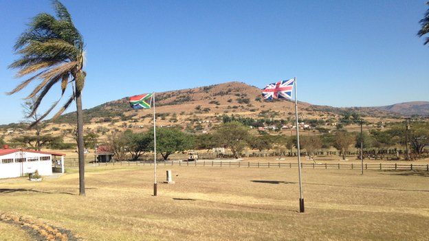 South African flag alongside the British flag at Rorke Drift
