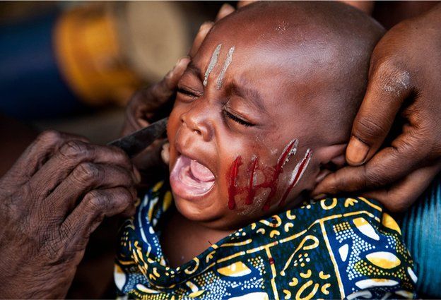 Boko's daughter Marina undergoing scarification