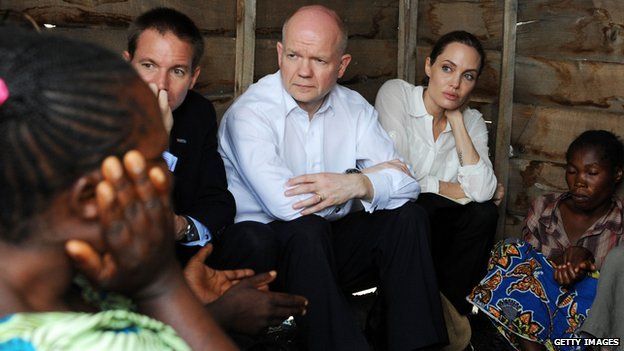 William Hague and Angelina Jolie at a rescue camp for women in the DRC (26 March 2013)