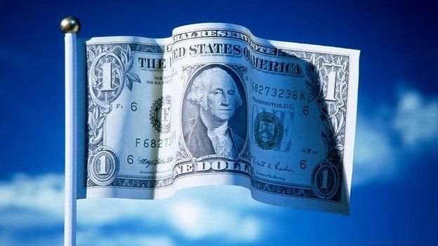Dollar bill on flagpole