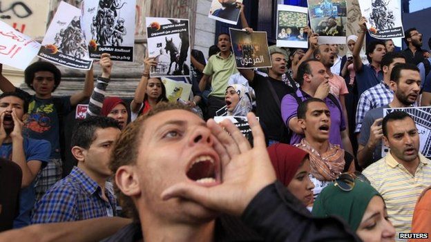 File photo: Members of the "April 6" and "Against you" movement with liberal activists shout slogans during a protest against presidential candidate and former army chief Abdel Fattah al-Sisi and a law restricting demonstrations as well as the crackdown on activists, in downtown Cairo, 24 May 2014