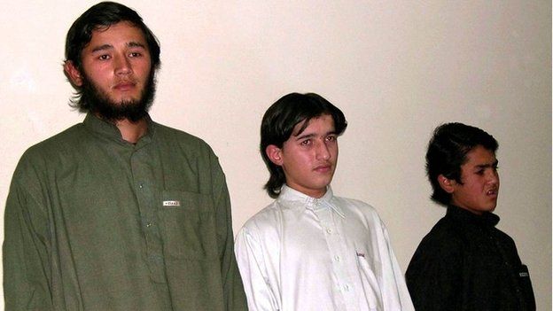 captured Central Asians alleged to be Islamic militants, from left, Abdul Qahar, 26, Mohammad Khalid, 16, and Hussain 14, are presented before media in Peshawar, Pakistan on Thursday, Nov 25, 2004.