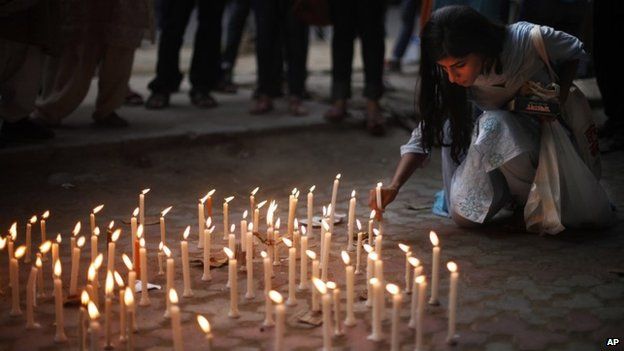 A candle lit vigil in Delhi on May 31, 2014 to protest against the gang rape of two teenage girls