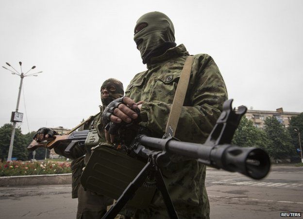 Rebel fighters in Snizhne, eastern Ukraine, 12 June
