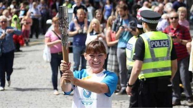 TV presenter Lorraine Kelly carried the baton on the Royal Mile