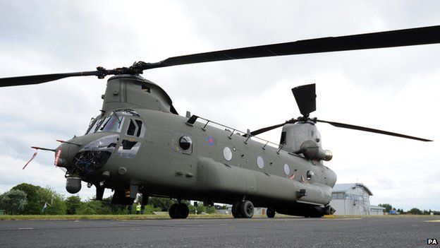 RAF unveils first of 14 new Chinook helicopters - BBC News