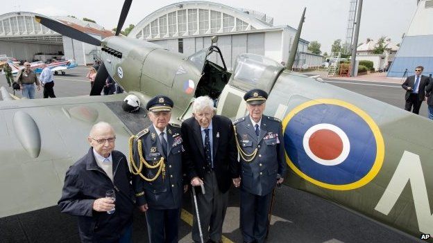 Czech war veterans, from left, navigator Petr Arton and pilots Emil Bocek, Thomas Gibian and Alois Dubec at the military airport in Prague-Kbely before the ceremonial unveiling of a bronze statue of a winged lion, 17 June 2014