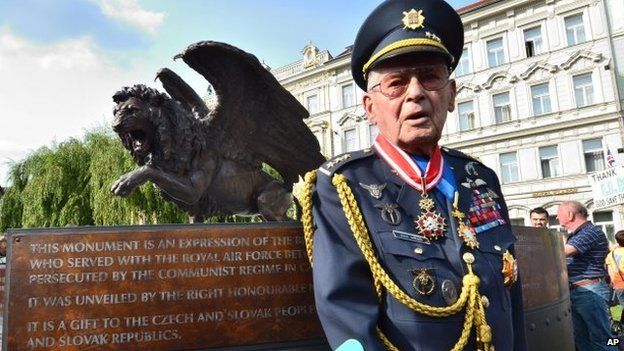 Czechoslovak war veteran Imrich Gablech, 98, poses in front of the monument in memory of Czechoslovak WW2 pilots in the British Royal Air Force (RAF), in Prague, 17 June 2014