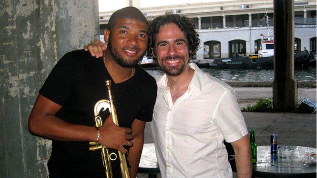 Alex Lacamorie with one of the musicians on the set of Carmen Jones in June 2014