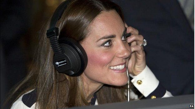 The Duchess of Cambridge "listens in on the enemy" during a visit to Bletchley Park