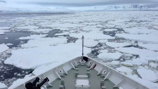 An icebreaker nudges its way towards Antarctica