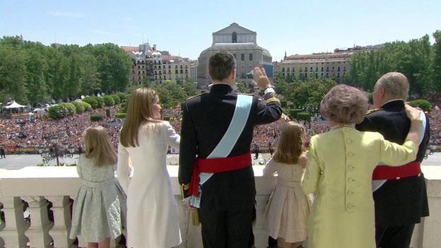 Royal family waves from the balcony at the Royal Palace in Madrid on 19 June 2014