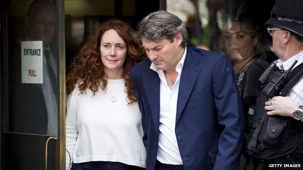 Rebekah and Charlie Brooks leaving court on 24 June 2014