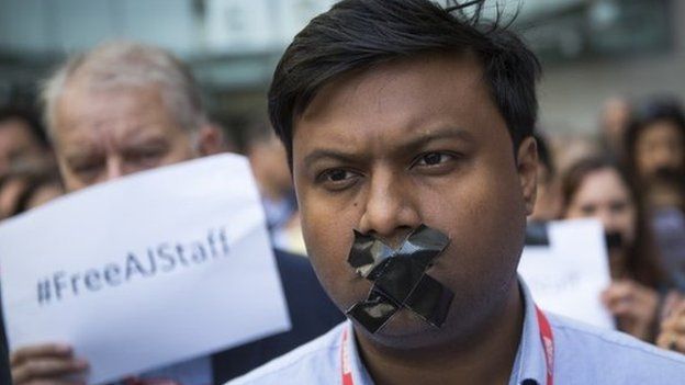 BBC staff and colleagues from other news organisations take part in a one-minute silent protest outside New Broadcasting House on 24 June 2014 in London, England