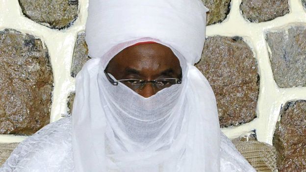 Lamido Sanusi, the new Emir of Kano, prays in Kano city on 10 June 2014
