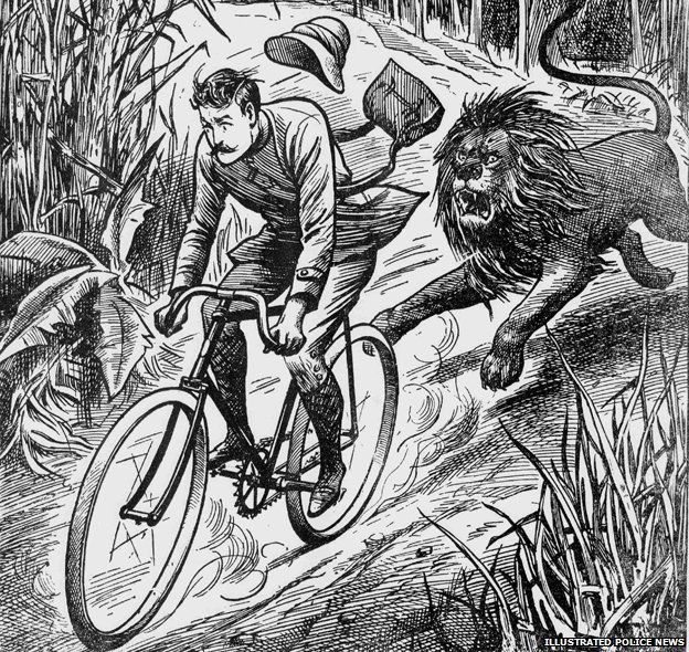 Man on bike being chased by a lion