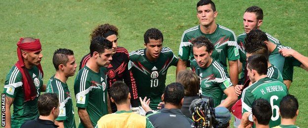 Mexico players take a drinks break
