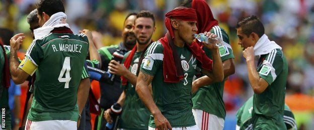 Mexico players take a drinks break