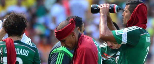 Mexico players enjoy the cooling break