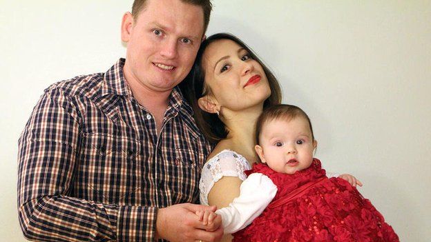 A picture of Alexander Sodiqov with his wife Musharraf and their young daughter was released by the family