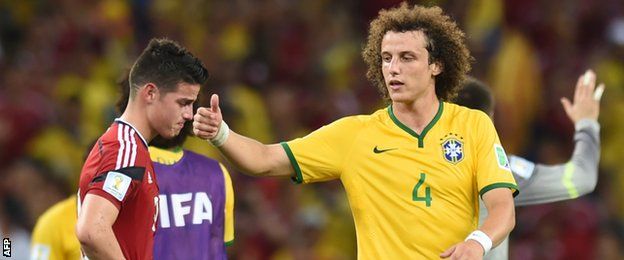 Brazil defender David Luiz consoles Colombia striker James Rodriguez