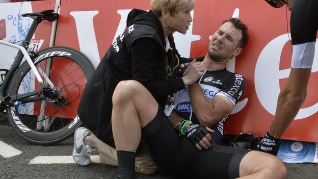 Mark Cavendish lies injured
