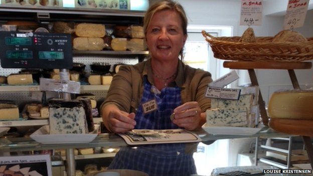 Sue Jensen in her cheese shop, "Øens Oste"