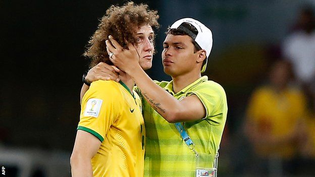 Brazil's David Luiz is comforted by Thiago Silva following the 7-1 defeat to Germany in the World Cup semi-final