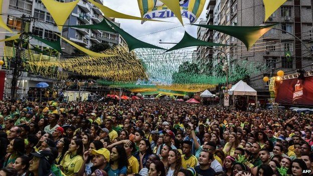Brazil's fans react during a public viewing event at a street in Rio de Janeiro