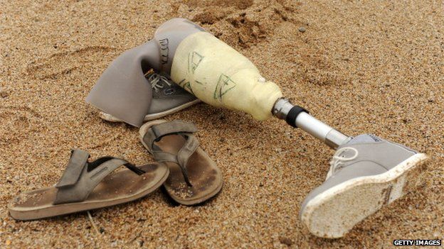 Prosthetic leg on the beach